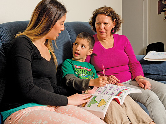 Jennifer Harrizon (left) with her 5-year-old son Elijah and her mother, Rosa Harrizon. Both women are higher-education advocates in Santa Ana. Jennifer Harrizon is a counselor in the Advancement Via Individual Determination (AVID) program, and her mother is coordinator of Padres Promotores de la Educacion (Parents Promoting Education).