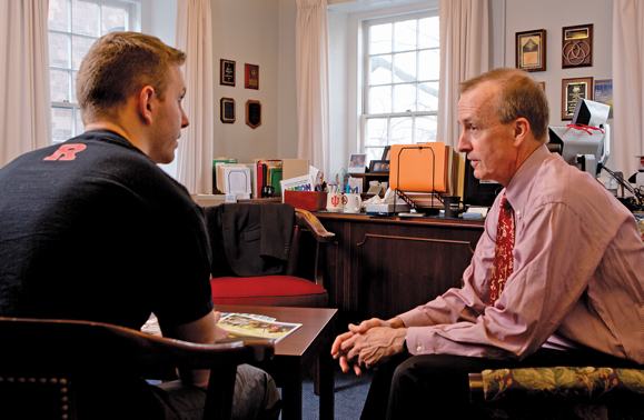 Will Madigan, president of the RU SERVS group, meets with Patrick Love, Rutgers University’s associate vice president for student affairs. Love says university staff and faculty need to understand that newly arrived veterans must be seen as arrivals from “another culture.”